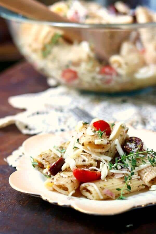 You'll love this easy pasta salad with Italian dressing! it's the perfect summer side dish. Or add one of the 20 suggested variations! From RestlessChipotle.com