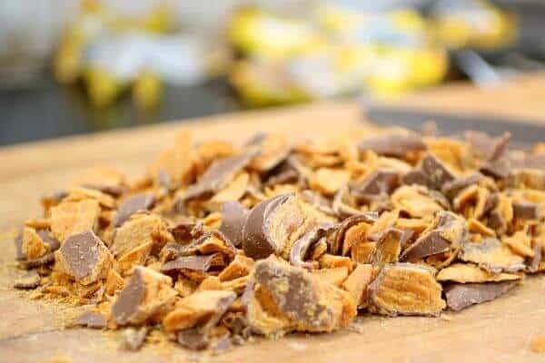Chopped Butterfingers bars for the top of the holy cow cake