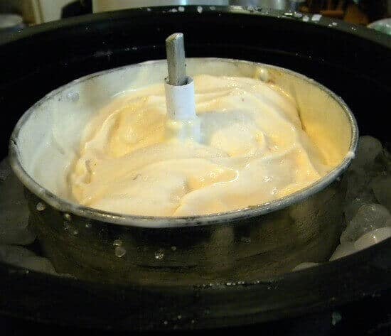 Coconut ice cream in an ice cream maker.