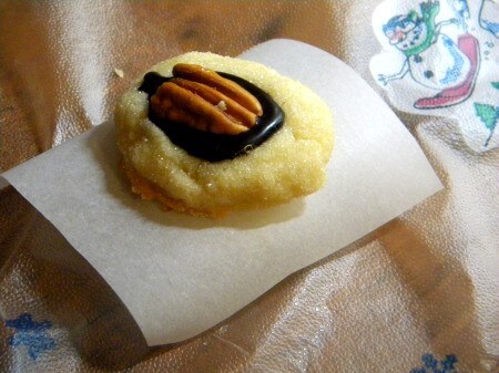 Cookies separated by parchment paper.