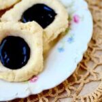 Easy Earl Grey Chocolate Thumbprint Cookies are old fashioned yumminess. From RestlessChipotle.com