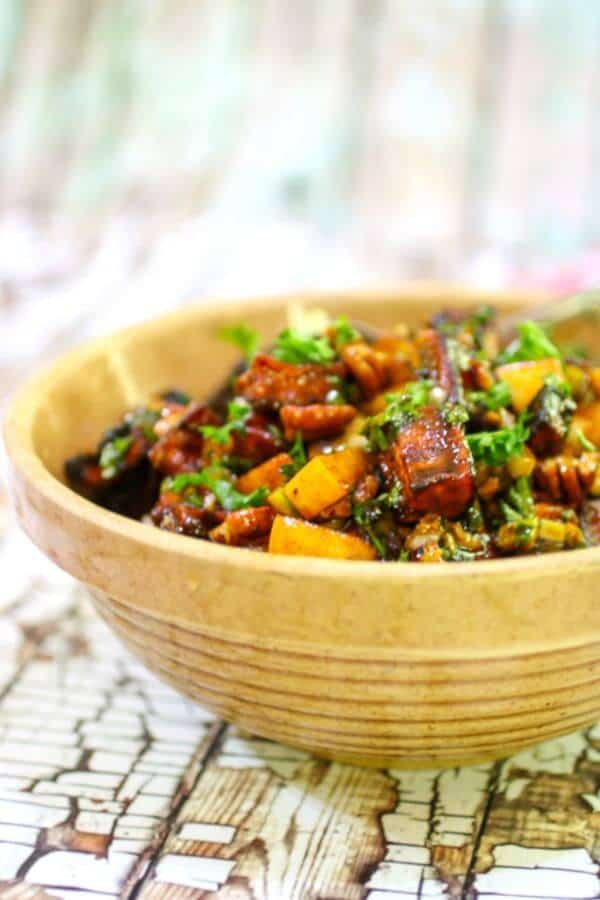 Closeup of a yellow ware bowl showing the caramelization on the sweet potatoes