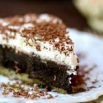Homemade French SIlk Pie recipe is full of creamy, rich, dark chocolate filling that melts in your mouth. From RestlessChipotle.com