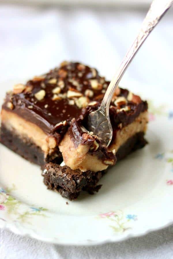 A cookie dough brownie with a fork cutting through.