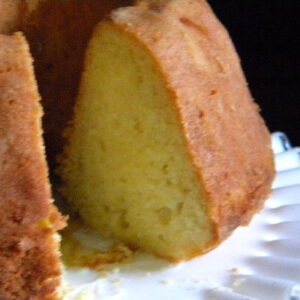 A sweet corn poundcake cut to show the velvety texture on the inside.