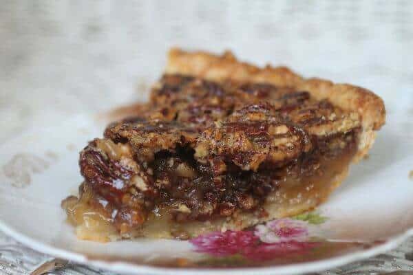 Side view of pecan pie slice - close up to show texture.