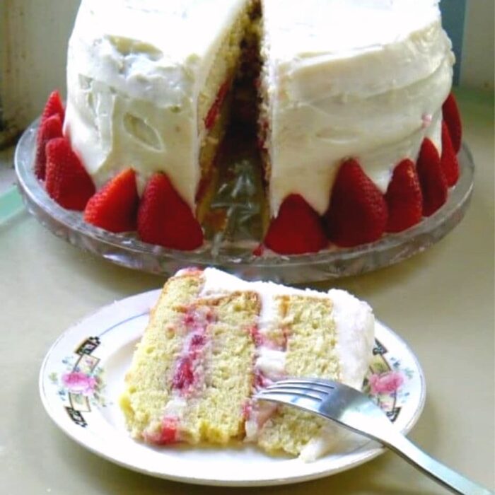 Slice of chantilly cake on a plate.