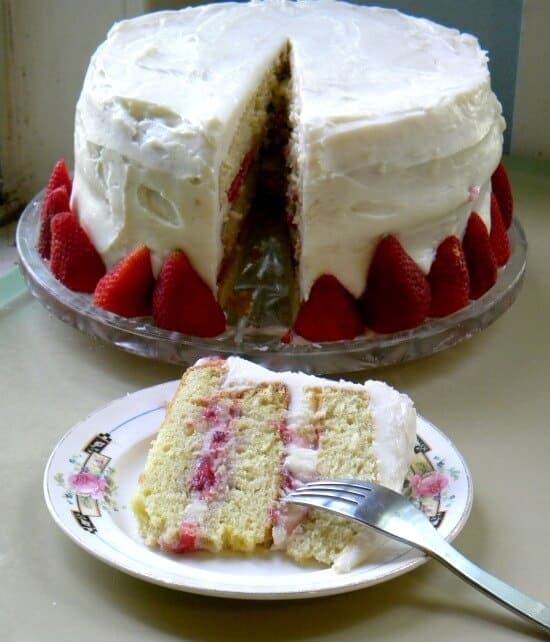 Italian Cream Cake has a cream cheese frosting and filling plus fresh strawberries. 