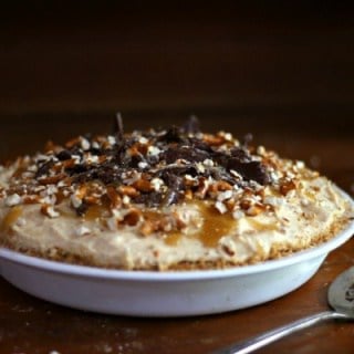 Peanut butter pie has a layer of caramel, a layer of ganache, and a layer of peanut butter mousse. So yummy! From RestlessChipotle.com