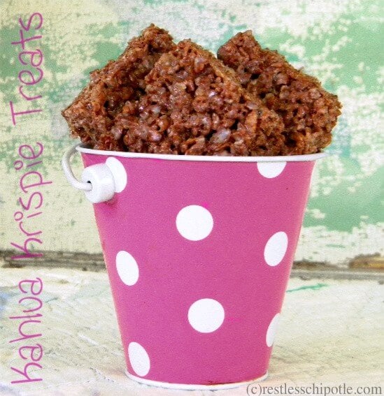 Kahlua and chocolate krispie treats in a pink pail.