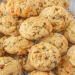 Close up of butter pecan toffee cookies with text overlay for Pinterest.