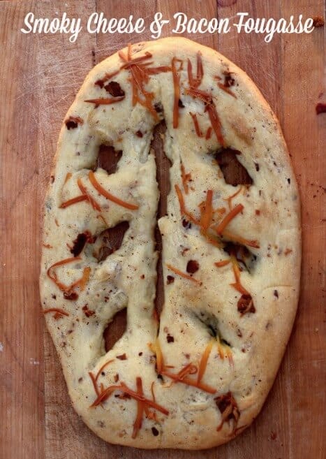 Fougasse loaf of bread on a table, showing the shape.