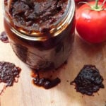 Red enchilada sauce in a jar.