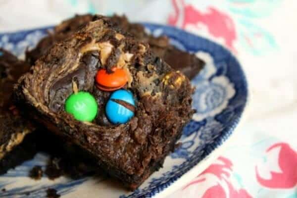M&M brownies on a blue plate.