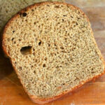 A closeup of a slice of wheat bread for featured image.