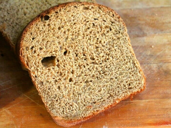 A closeup of a slice of wheat bread.