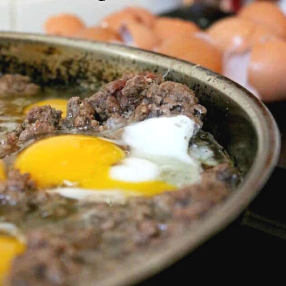 Homemade dog food in a pan on the stove.