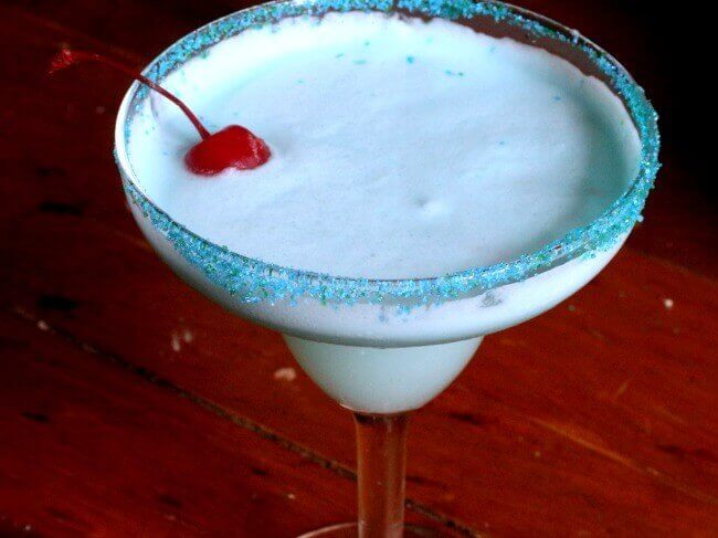 Overhead view of a creamy, blue cocktail.