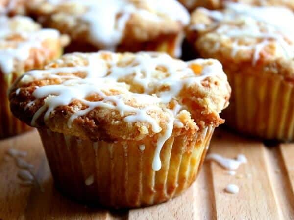 peach muffins with white chocolate chips streusel and a bourbon glaze are summer on a plate... from restlesschipotle.com