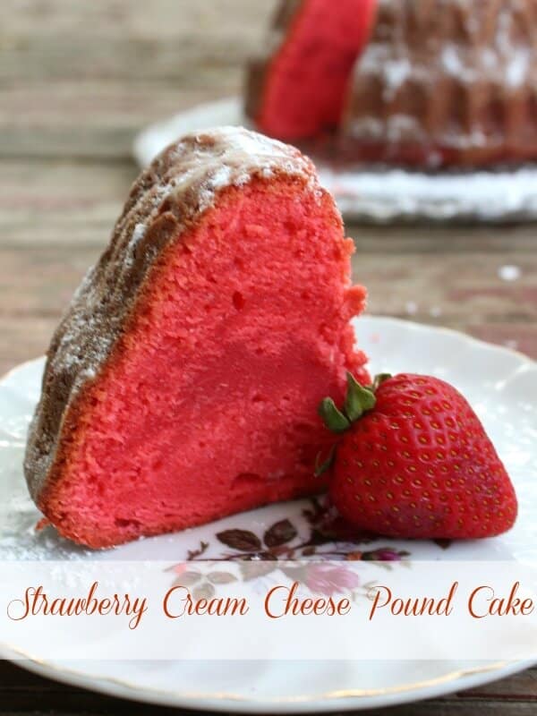 A slice of bright pink strawberry pound cake with title text overlay.