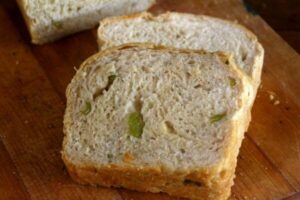 Hatch chile cheese bread is tender and light with lots of smoky, cheesy flavor and a Hatch chile kick. From Restlesschipotle.com