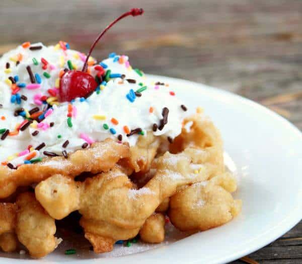 Homemade funnel cakes are easy to make and totally addictive. Top with your favorite toppings. Restlesschipotle.com