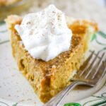 slice of butternut squash pie with whipped cream