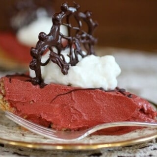 Red Velvet French Silk pie is creamy, rich, and full of Red Velvet flavor. Perfect for Christmas or Valentines Day! From RestlessChipotle.com