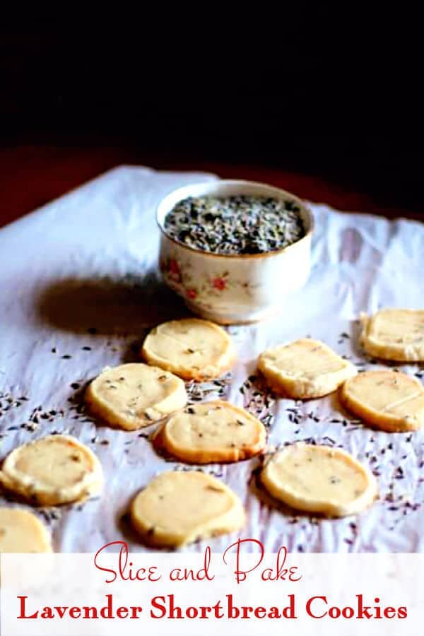 Baked lavender shortbread cookies on a piece of parchment.