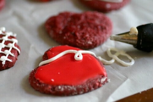 Red velvet cookies cut out like hearts.
