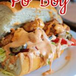 Chicken Po' Boy sandwich with text overlay for Pinterest