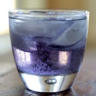 a cocktail made with creme de violette, this violet crumble drink is all kinds of pretty! SO yummy, too! From RestlessChipotle.com