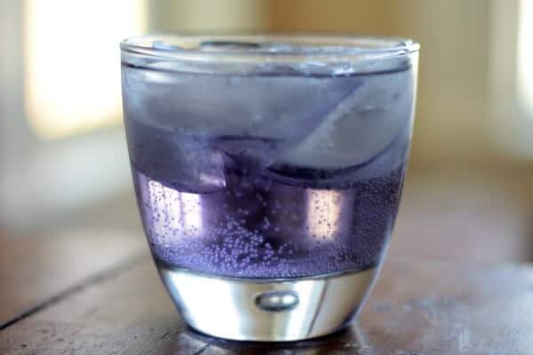 a cocktail made with creme de violette, this violet crumble drink is all kinds of pretty! SO yummy, too! From RestlessChipotle.com
