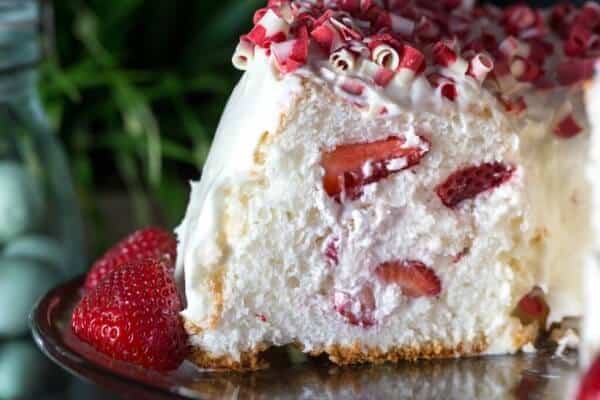 strawberry and cream filled angel food cake slice is one of many perfect easter dessert ideas