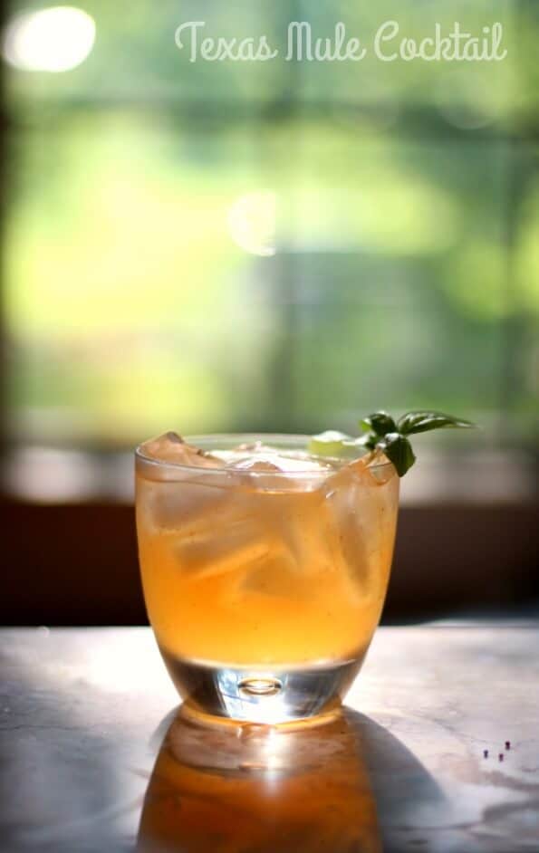 A Mexican mule made with tequila on a table.