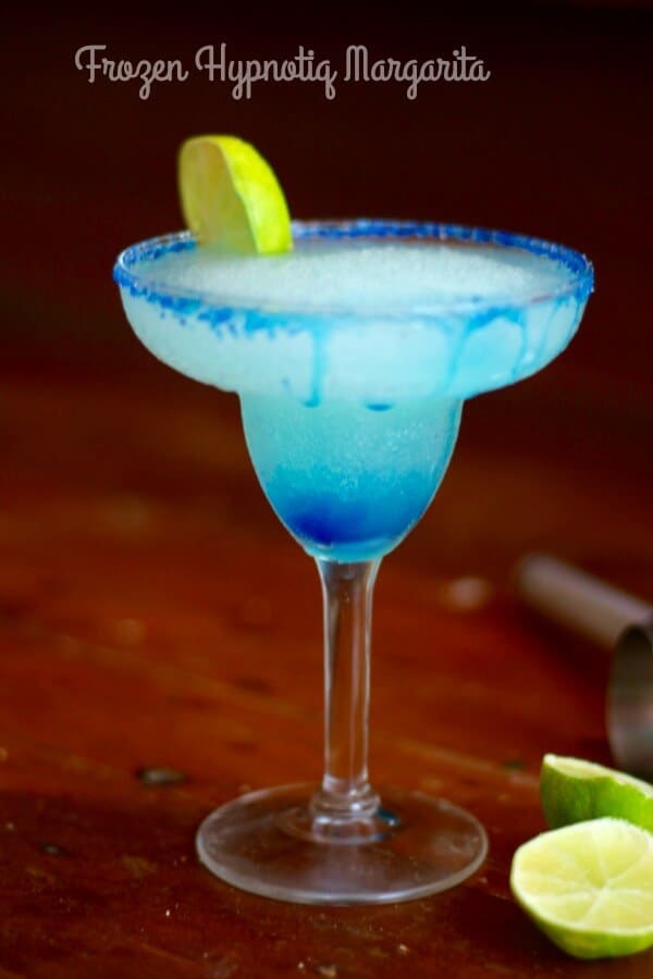 This frozen Hypnotiq margarita is a beautiful pastel blue cocktail. Perfect for summer! From RestlessCHipotle.com