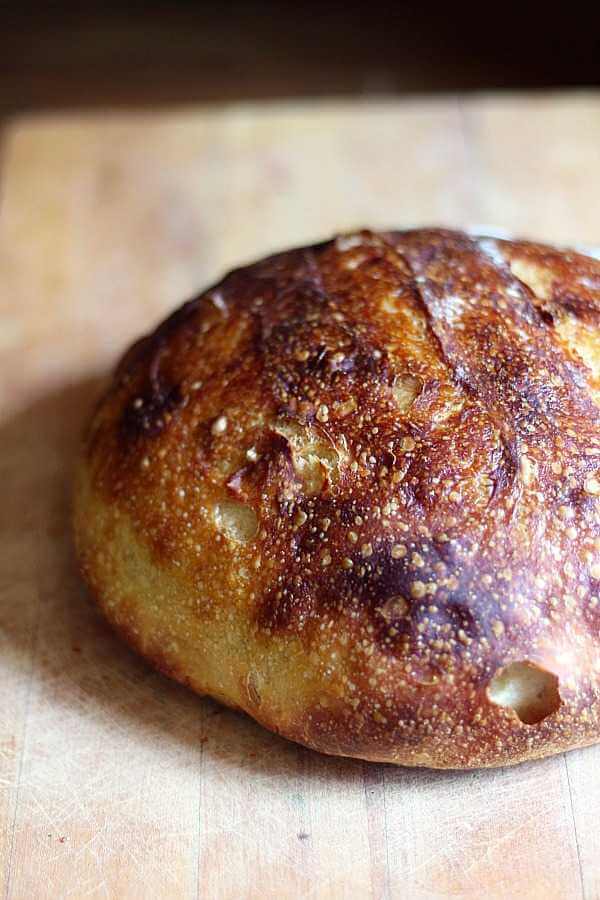 A round loaf of sourdough bread.