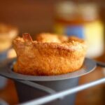 These easy cornmeal popovers have a crispy crust and a hollow inside to fill with your favorite things. Like honey. Or jam. From RestlessChipotle.com
