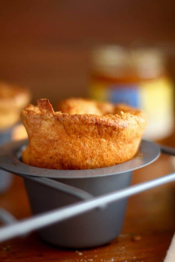 These easy cornmeal popovers have a crispy crust and a hollow inside to fill with your favorite things. Like honey. Or jam. From RestlessChipotle.com