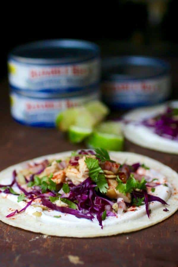 Easy tuna tacos can be on the table in less than 10 minutes. Kid friendly! From RestlessChipotle.com