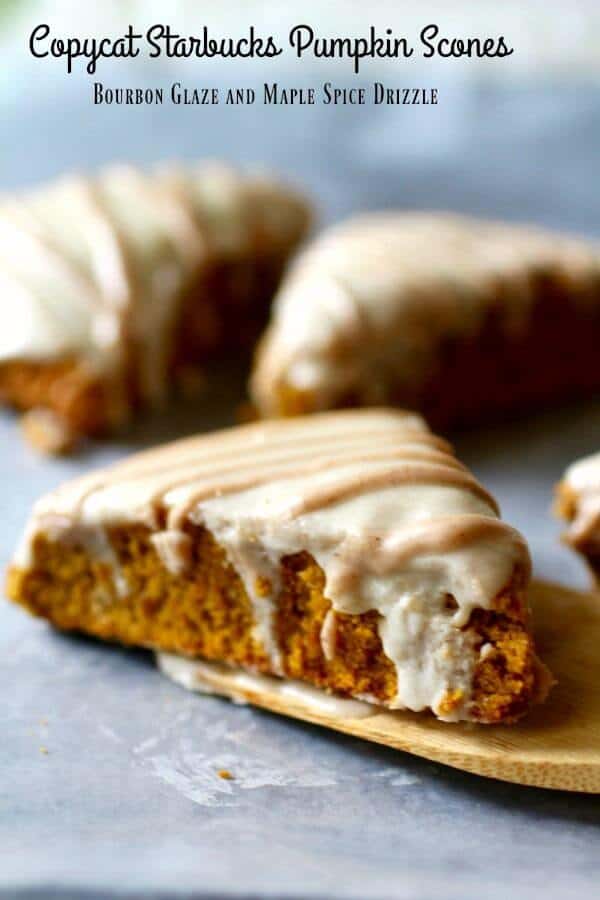 Pumpkin Scones on a table with a wooden spatula.