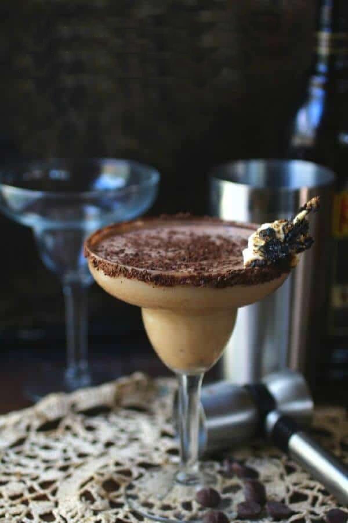 A creamy chocolate cocktail in a martini glass.