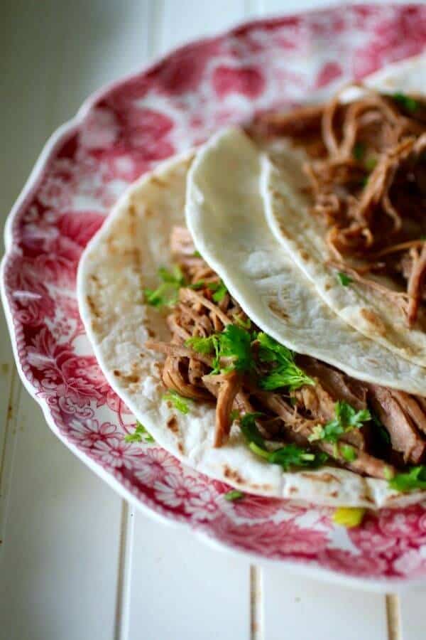 Slow cooker beef barbacoa recipe is easy! From RestlessChipotle.com