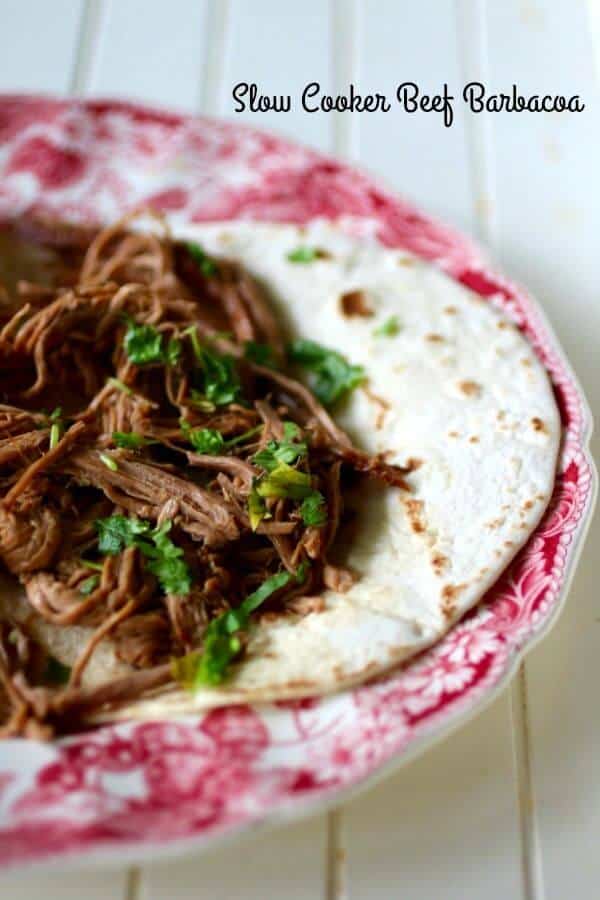 Slow Cooker beef barbacoa recipe is super easy and totally yummy! From RestlessChipotle.com