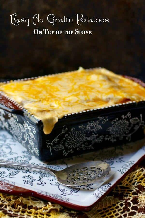 Au gratin potatoes in a casserole dish with title text overlay.