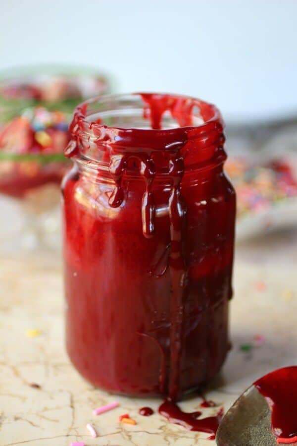 Best homemade hot fudge sauce recipe ever! This easy red velvet hot fudge is perfect for Christmas and Valentine's Day! #christmas #valentinesday #hotfudge So creamy and delicious! Homemade hot fudge sauce with sweet red velvet flavor! From RestlessChipotle.com