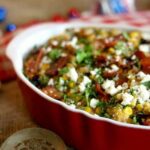 Poblano, cream cheese, smoky bacon... yum! This corn bacon casserole is SO good! From RestlessChipotle.com