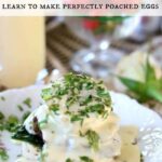 A vintage plate with a serving of Eggs Benedict on it