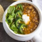 easy, spicy lentil soup recipe goes together fast and is budget friendly! From RestlessChipotle.com
