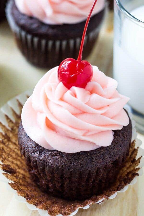 This chocolate cherry cupcakes recipe starts with rich, moist chocolate cupcakes. Then they're topped with maraschino buttercream frosting. Like a chocolate covered cherry in cupcake form!